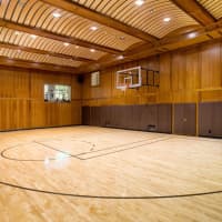 <p>The home also includes a basketball court.</p>