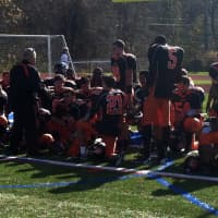 <p>The Tuckahoe Tigers huddle up after their win in the Section 1 Class D championship game.</p>