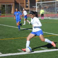 <p>Blind Brook&#x27;s Clara Jacob prepares to send a pass to a teammate in the Trojans&#x27;s 2-0 loss to North Salem Sunday in a Section 1 Class B Girls&#x27; Soccer Championship quarterfinal game.</p>