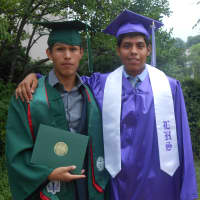 <p>David Lopez (Gorton High School) and cousin Josias Cruz (Lincoln High School) both were happy to be graduating on the same day. Both graduations were at the Westchester County Center.</p>