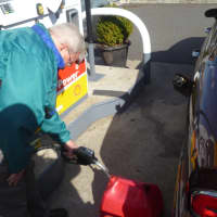 <p>Craig Frey of Long Island filled up his car and two gas cans in Harrison on Monday.</p>