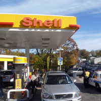 <p>Long lines at gas stations, including this Shell station on McLean Avenue, continued to persist in Yonkers Monday.</p>