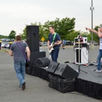 <p>Fast Ricky performs the first set in the parking lot at the Danbury Fair Mall. </p>
