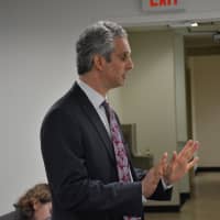 <p>Attorney Neil Alexander speaks to the Bedford Planning Board.</p>