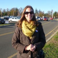 <p>Chrissy Woerz of New Canaan cast her vote for President Barack Obama because she supports same-sex marriage. </p>