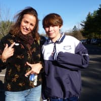 <p>Wilton resident Terri Sheridan, left, and her son Brad, 13, show off their &quot;I Voted&quot; stickers after Terri voted on Tuesday. </p>