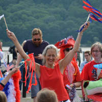<p>Dance instructor Suzi Tortora leads a group of kids in a performance along the Cold Spring waterfront.</p>