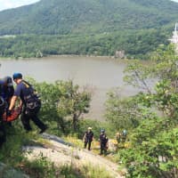 <p>Emergency responders at the scene of the incident involving an injured hiker near the Bear Mountain Bridge on Sunday morning.</p>