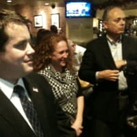 <p>From left, Democrats Andres Bermudez-Hallstrom, Ilissa Miller and Leon Potok celebrate Tuesday night.</p>