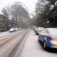 <p>A sheet of icy snow covered Yonkers streets by mid afternoon Wednesday, making slick conditions for drivers. </p>