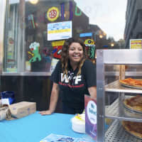 <p>Two Boots brings its pizzas out to the sidewalk for Tuesday&#x27;s block party.</p>