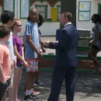 <p>Rob Astorino meets some of the students who met the ACE challenge Tuesday at Rye Playland.</p>