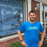 <p>Preston Ranton, general manager of Soundrunner, poses outside of his new store. Soundrunner is scheduled to open its Fairfield location in August.</p>