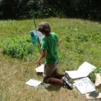 <p>A young painter creates a masterpiece at Weir Farm National Historic Site.</p>