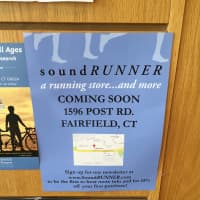<p>A banner announcing the arrival of Soundrunner hangs on the bulletin board of the Fairfield University Bookstore in downtown Fairfield.</p>