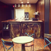 <p>Scarsdale&#x27;s new Skinny (but cozy) Buddha cafe includes four tables and eight seats as well as a window bench that seats four across from the Metro-North railroad station.</p>