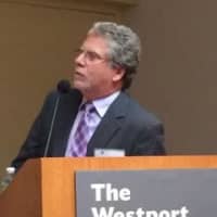 <p>Matt Mandell, CEO of the Westport-Weston Chamber of Commerce, takes over as moderator at the Westport Library. </p>