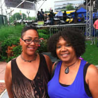 <p>Renée Robinson, left, and Paula Bell, are two of the fans of Gloria Gaynor at the Jazz-Up July series Wednesday.</p>