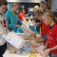 <p>Darien kids make sandwiches and put them into decorated bags for victims of Hurricane Sandy.</p>