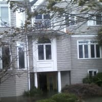 <p>The front door of this home on Soundview Drive was broken open by floodwaters during Hurricane Sandy. </p>