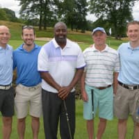 <p>Former New York Giant Rodney Hampton (center) with left to right: WPH Board of Directors Member John Jureller, Michael Jureller, Hans Flagg, and Brett Jureller at the sixth annual Ahmad Rashad Golf Classic at the Quaker Ridge Golf Club.</p>