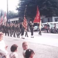 <p>An historical photo of the parade.</p>
