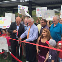 <p>Ripken and Bridgeport Mayor Bill Finch cut the ribbon on the new Youth Development Park at Florence E. Blackham School in Bridgeport.</p>