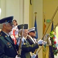 <p>From left, veterans Rob Tirreno, Larry Tirreno and Frank Vino hold the colors during Westport&#x27;s Veterans Day Ceremony.</p>