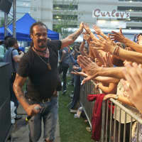 <p>Michael Franti thrills the crowd by getting up close and personal during Thursday night&#x27;s show.</p>