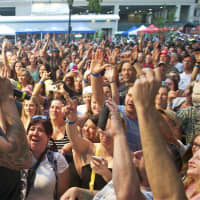 <p>Michael Franti thrills the crowd by getting up close and personal during Thursday night&#x27;s show.</p>