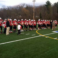 <p>The Somers High School football team watches Cornwall receive a plaque for winning Monday&#x27;s state quarterfinal game.</p>