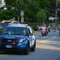 <p>Westchester County police vehicles kick off Mount Kisco&#x27;s firefighters parade.</p>