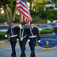 <p>Katonah firefighters march in the Mount Kisco parade.</p>