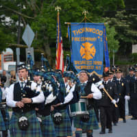 <p>Bagpipers and Thornwood firefighters march in the Mount Kisco parade.</p>