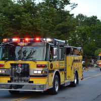 <p>Thornwood&#x27;s yellow firetrucks are driven in the Mount Kisco parade.</p>