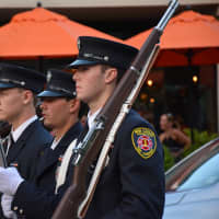 <p>New Canaan firefighters march in the Mount Kisco parade.</p>