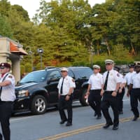 <p>Greenwich firefighters march in the Mount Kisco parade.</p>