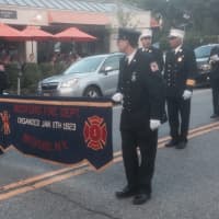 <p>Bedford firefighters march in the Mount Kisco parade.</p>