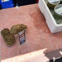 <p>Miniature bales of hail decorate the stand for Redding-based Carrot Top Kitchens.</p>