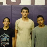 <p>Returning veterans, from left, NIck Barbaria, Kurt Schwartz and Lamont Wallace and their New Rochelle varsity wrestlling teammates opened practice Monday.</p>