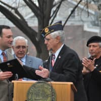 <p>John Donohue of the Peekskill American Legion thanks Jerry Nappi of Entergy for the company&#x27;s financial support.</p>