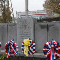 <p>Wreaths places at the war memorial in Monument Park.</p>