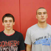 <p>Seniors Dylan Realbuto, left, and Mark Lasar are the leaders on a Somers&#x27; wrestling team that is aiming to resume where it concluded the 2012 season.</p>