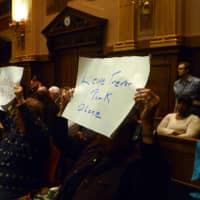 <p>Yonkers residents display their &quot;Leave Trevor Park Alone&quot; signs Wednesday at a meeting of the city&#x27;s Planning Board. </p>