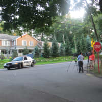 <p>Greenburgh police and TV news crews at the corner of Payne and Bayberry roads in Elmsford, the scene of a shooting on Monday.</p>