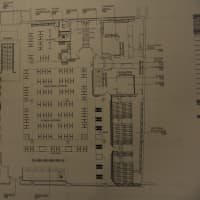 <p>A photo of the proposed floor plan for the upper level of Modell&#x27;s. The bottom of the floor plan visual is oriented towards East Main Street.</p>