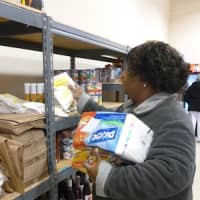 <p>Felicia Medley picks up food at The Food Bank for Westchester for Bowen Community Outreach in Mount Vernon.</p>
