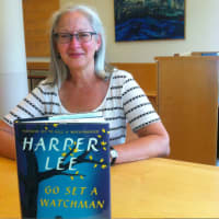 <p>Maria Higbie, a clerk at Greenwich Library, shows off Harper Lee&#x27;s new book, &quot;Go Set a Watchman.&quot; </p>