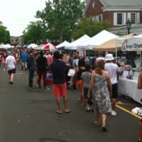 <p>The crowd checks out the various tents at New Canaan&#x27;s sidewalk sale Saturday.</p>
