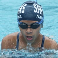 <p>Nicole Marcatoma, of Ossining, competes in the breast stroke.</p>